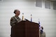 Col. Dina, 432nd Mission Support Group commander, speaks to Airmen and family members of the 432nd Wing/432nd Air Expeditionary Wing during her assumption of command ceremony at Creech Air Force Base.