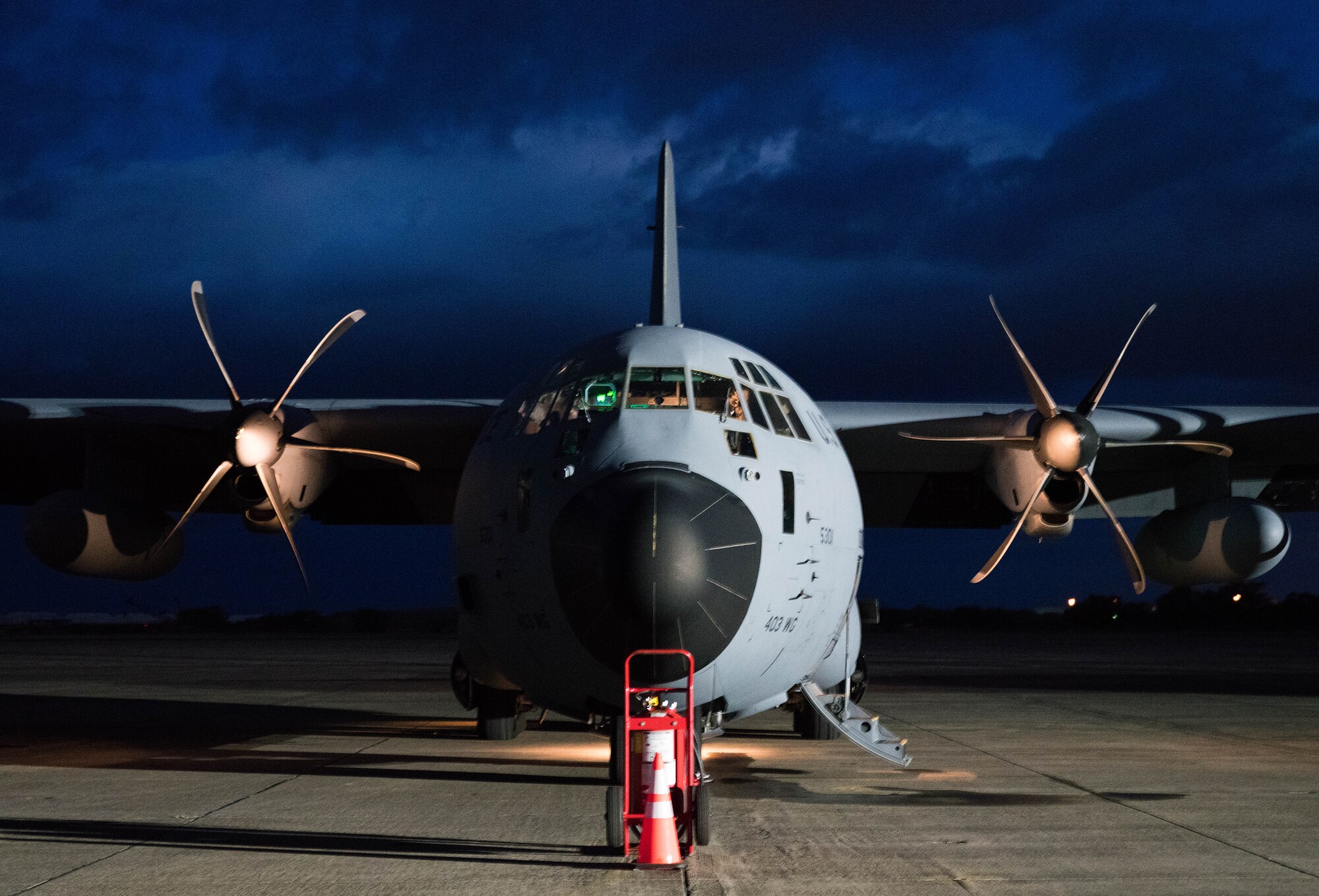 An Air Force Reserve Hurricane Hunter aircrew runs its flight checklists preparing to fly into Hurricane Douglas, the first hurricane in the Pacific this season, July 26, 2020, to collect weather data to assist the Central Pacific Hurricane Center with their forecasts. The 53rd Weather Reconnaissance Squadron, assigned to the 403rd Wing at Keesler Air Force Base, Mississippi, departed July 22 to conduct operations out of Barbers Point Kapolie Airport, Hawaii. (U.S. Air Force photo by Lt. Col. Marnee A.C. Losurdo)