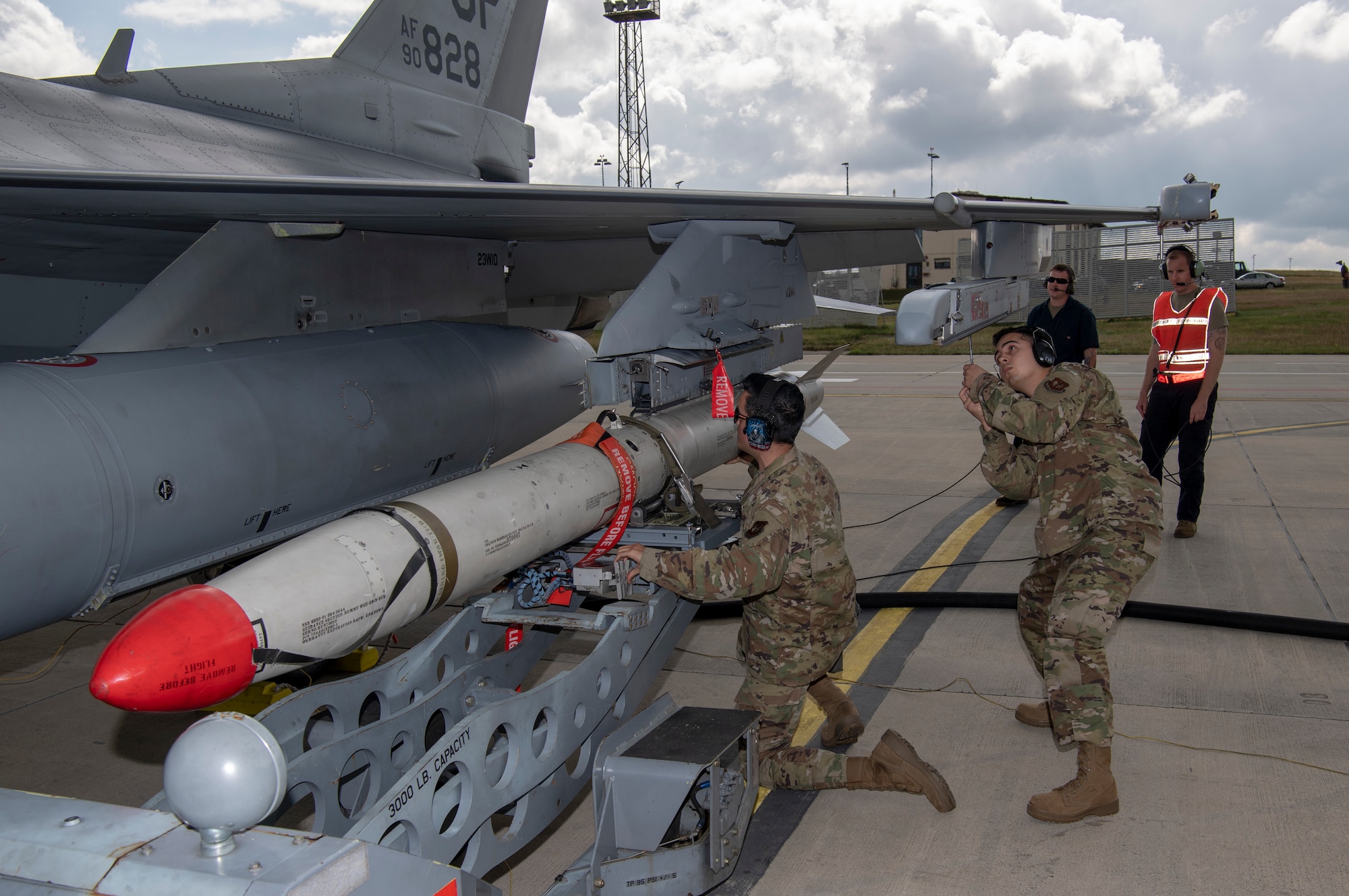 U.S. Air Force Airmen and military aircraft on the flight line