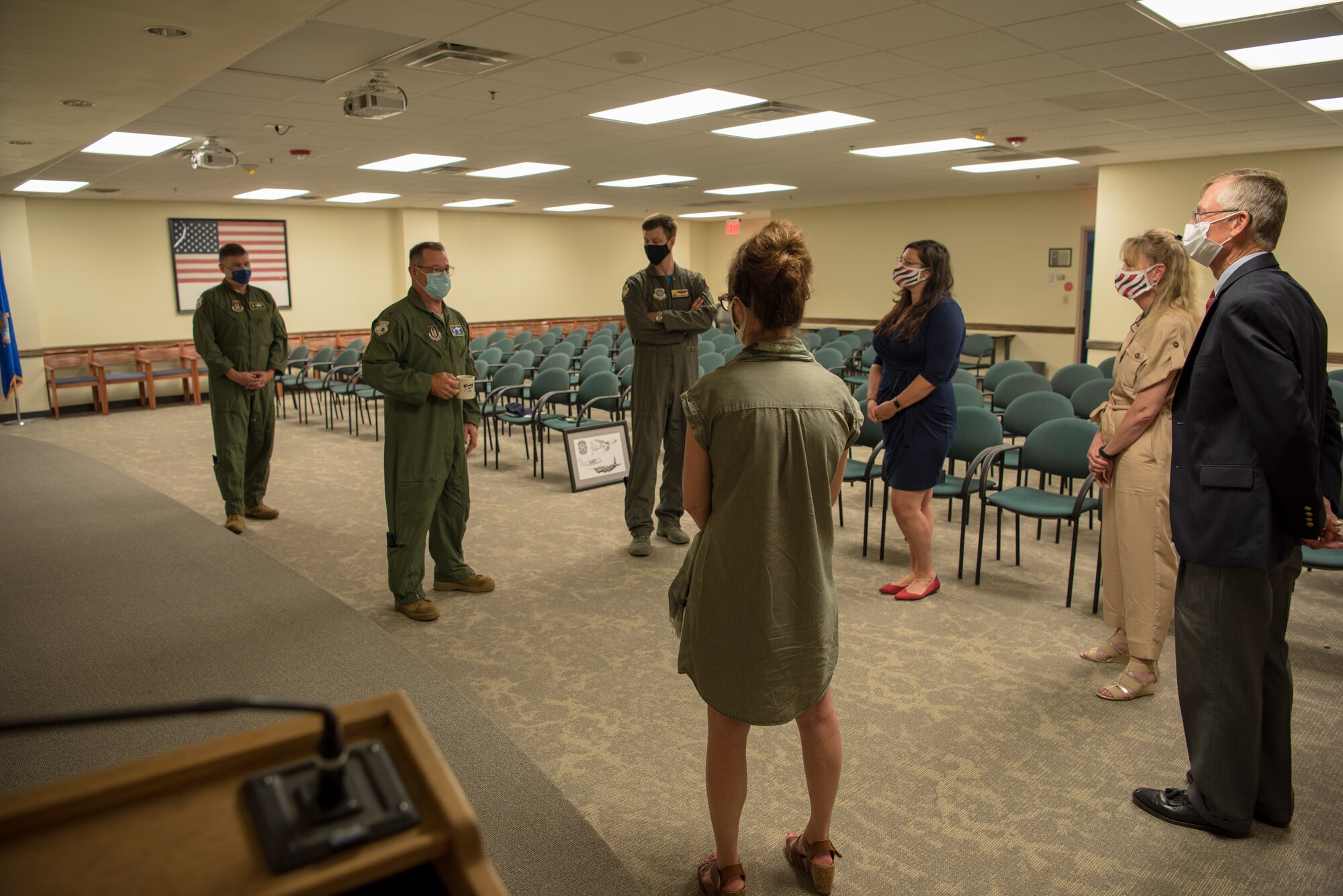 Col. Adam Willis ,315th Airlift Wing Commander, Joint Base Charleston, South Carolina, Col. Don Thigpen,315th Airlift Wing Vice Commander, and Col. Clint ZumBrunnen, 437th Airlift Wing Commander, Joint Base Charleston speak to Charleston community leaders after they were presented artwork July 17, 2020 at Joint Base Charleston. The hand drawn artwork was completed by Senior Airman Mike Liu, aeromedical evacuation technician, 433rd Airlift Wing, Joint Base San Antonio-Lackland, Texas