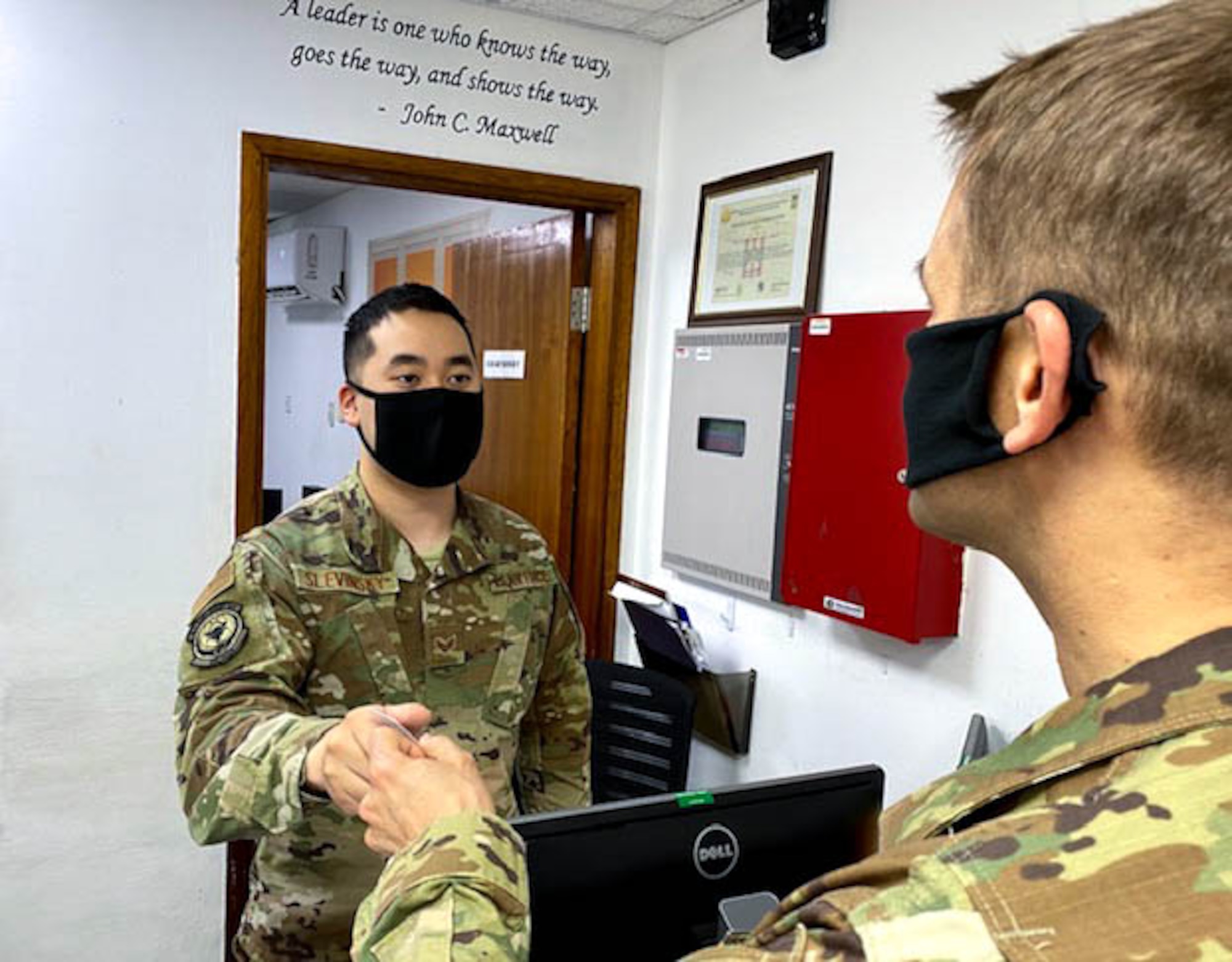 Airman 1st Class Peter Slevinsky, a 380th Air Expeditionary Wing Personnel Support for Contingency Operations sustainment technician, is a part of a team who assists wing members with Common Access Cards, reenlisments, and extentions on a daily basis, Monday, July 27, 2020, Al Dhafra Air Base, United Arab Emirates. PERSCO members also assist with emergency leave requests and accountability. (U.S. Air Force photo by Tech. Sgt. Melissa Harvey)