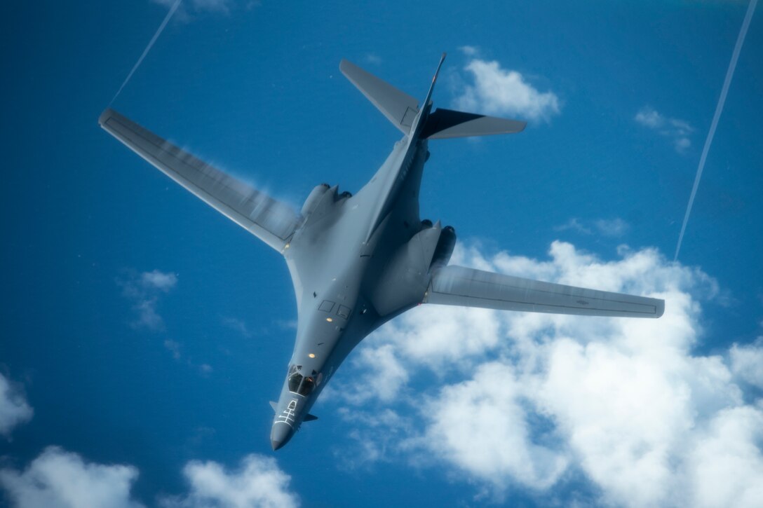 A 28th Bomb Wing B-1B Lancer, from Ellsworth Air Force Base, S.D., conducts aerial refueling with a 909th Aerial Refueling Squadron KC-135 Stratotanker, from Kadena Air Base, Japan, during a Bomber Task Force (BTF) mission July 27, 2020. The BTF missions are intended to demonstrate U.S. commitment to the collective defense of the U.S. Indo-Pacific Command theater and are a visible demonstration of the U.S. capability of extended deterrence. (U.S. Air Force photo by Staff Sgt. Peter Reft)