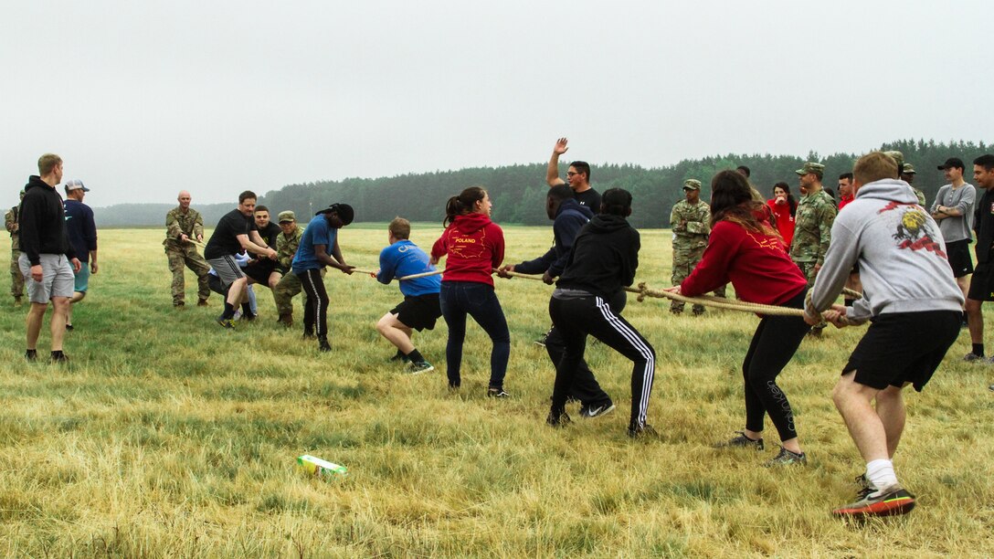 Soldiers from the U.S. and Poland Polish host local children for base visit