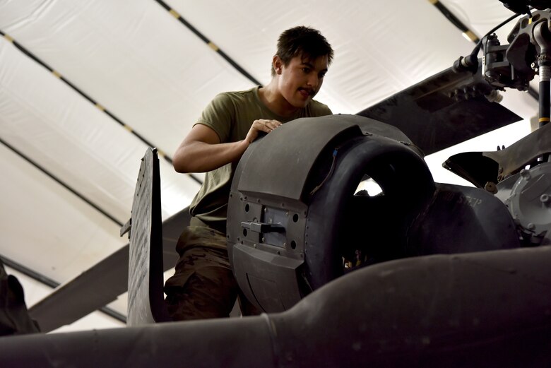 U.S. Army Soldiers from Task Force Javelin conduct maintenance on a UH-60 Blackhawk helicopter at Prince Sultan Air Base, Kingdom of Saudi Arabia