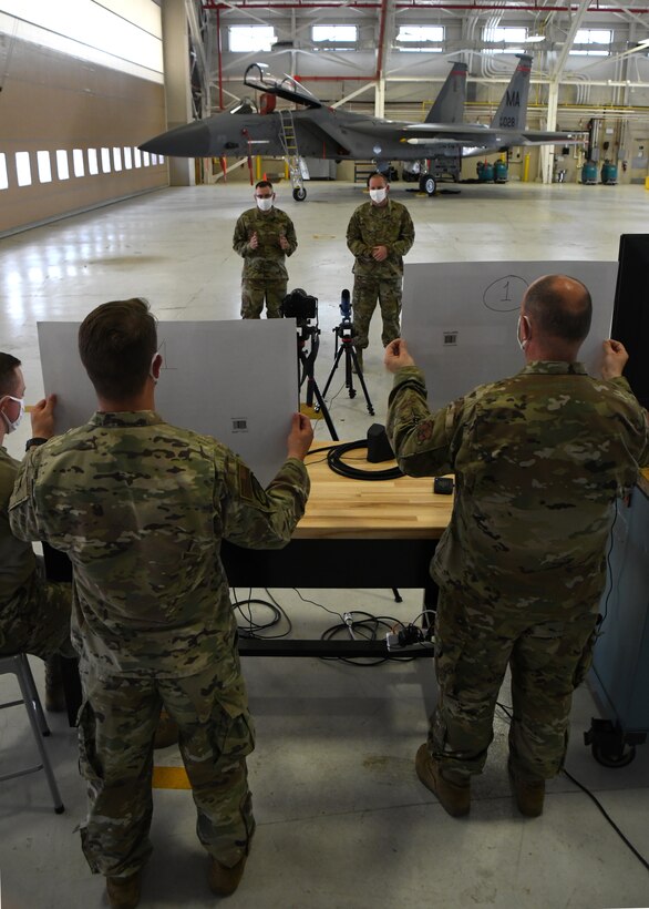 Master Sgt. Bob Oleksak, 104th Maintenance Group fabrication Element supervisor, and Master Sgt. Leo Burbee, 104th Maintenance Group structural maintenance supervisor, present their idea for a new cold work aircraft panel repair method via televideo conference June 12, 2020, at Barnes Air National Guard Base, Massachusetts. Oleksak and Burbee presented their idea to the judges as one of the final four teams competing. (U.S. Air National Guard photo by Airman 1st Class Sara Kolinski)