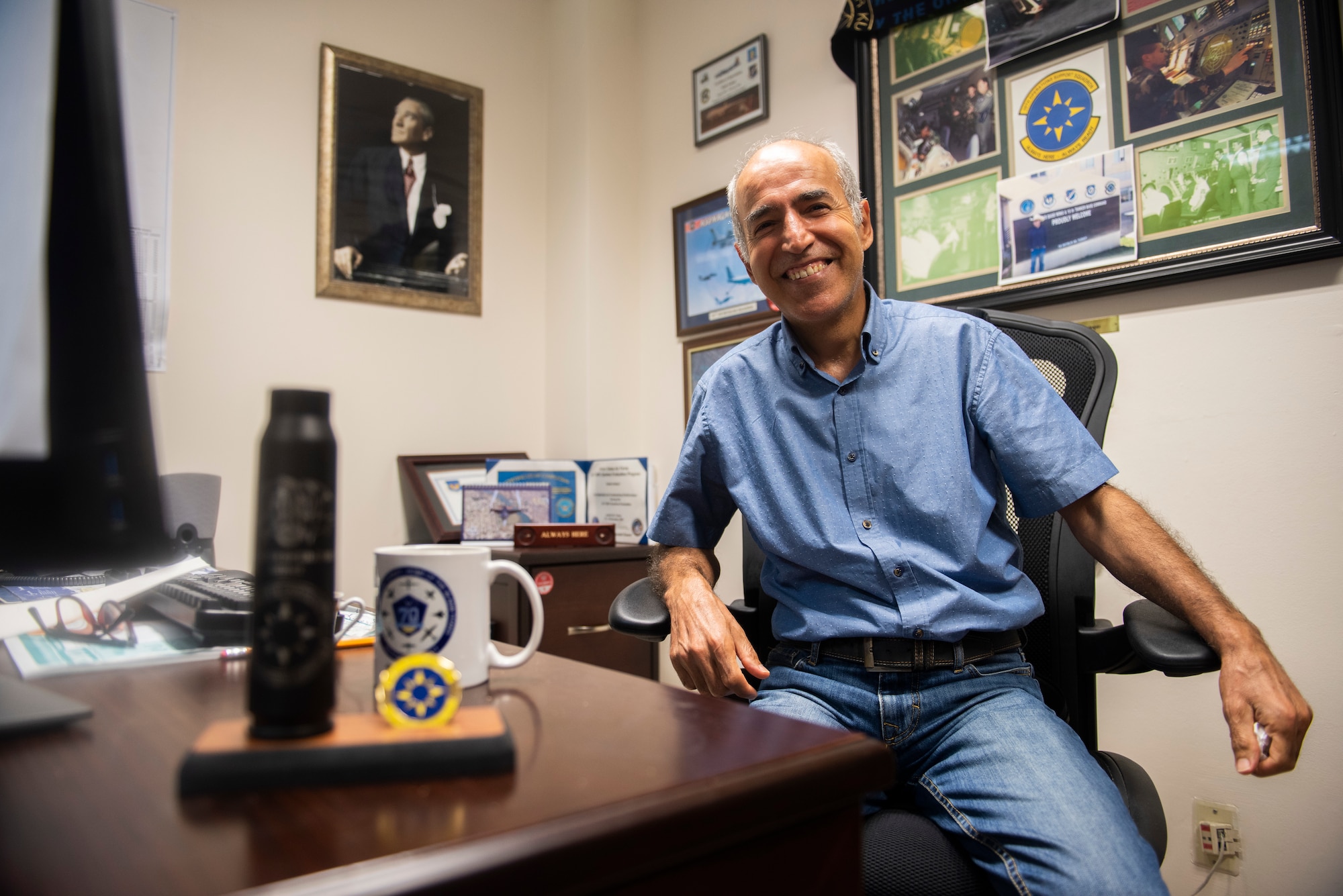 Photo of Turkish translator sitting down