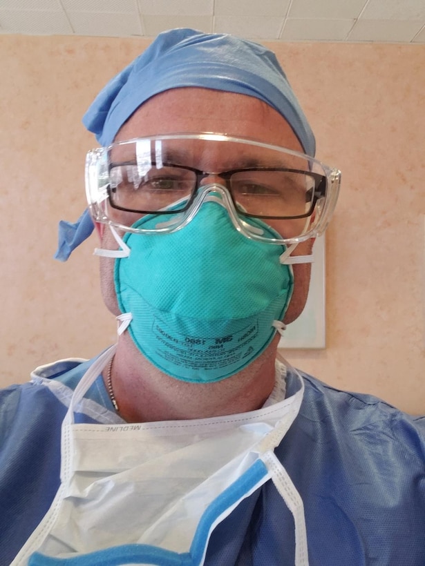 Maj. Leslie Shook takes a selfie in his medical personal protective equipment while working in Lincoln Medical Hospital in New York.