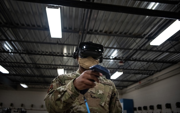 Airman 1st Class Delwyn Travillion, 56th Component Maintenance Squadron aircrew egress systems apprentice, trains on a virtual reality maintenance trainer July 13, 2020, at Luke Air Force Base, Ariz. The Egress Systems Flight implemented the virtual reality maintenance trainer to enhance training efficiency and reduce training time. The 56th Fighter Wing’s mission is to train the world’s greatest fighter pilots and combat ready Airmen. (U.S. Air Force photo by Airman 1st Class Dominic Tyler)