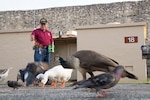 Adam Quintero feeds the ducks, geese and pigeons at the U.S. Army North Quadrangle July 28, 2020. Quintero retires from federal service July 31 with more than 50 years of service
