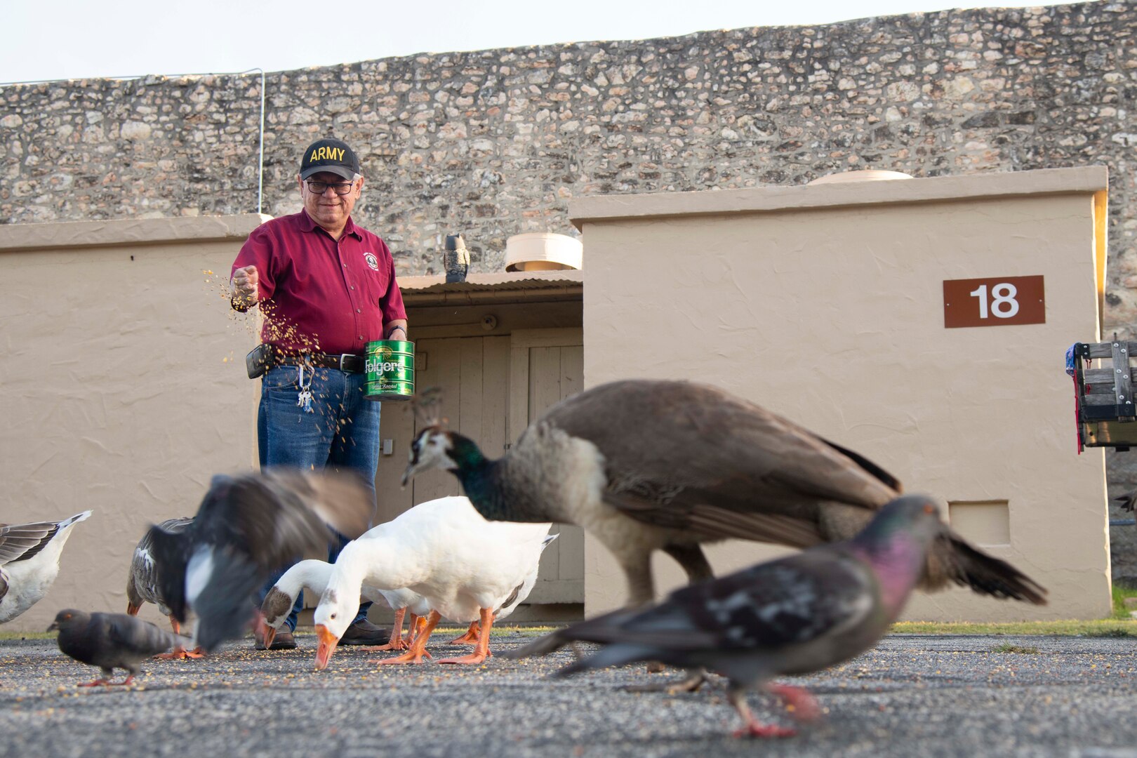 Adam Quintero feeds the ducks, geese and pigeons at the U.S. Army North Quadrangle July 28, 2020. Quintero retires from federal service July 31 with more than 50 years of service