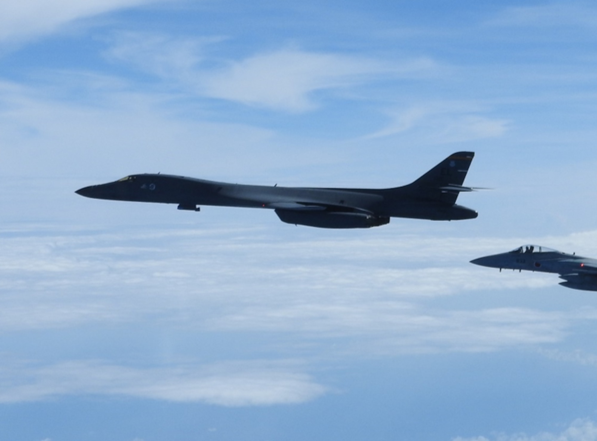 A B-1B Lancer conducts integration training with the Koku-Jieitai, or Japanese Air Self-Defense Force (JASDF) in the vicinity of Japan, July 27, 2020. The B-1s integrated with Koku-Jietai F-2s to enhance bilateral interoperability and mutual readiness between the U.S. and Japan. (Photo Courtesy of JASDF)