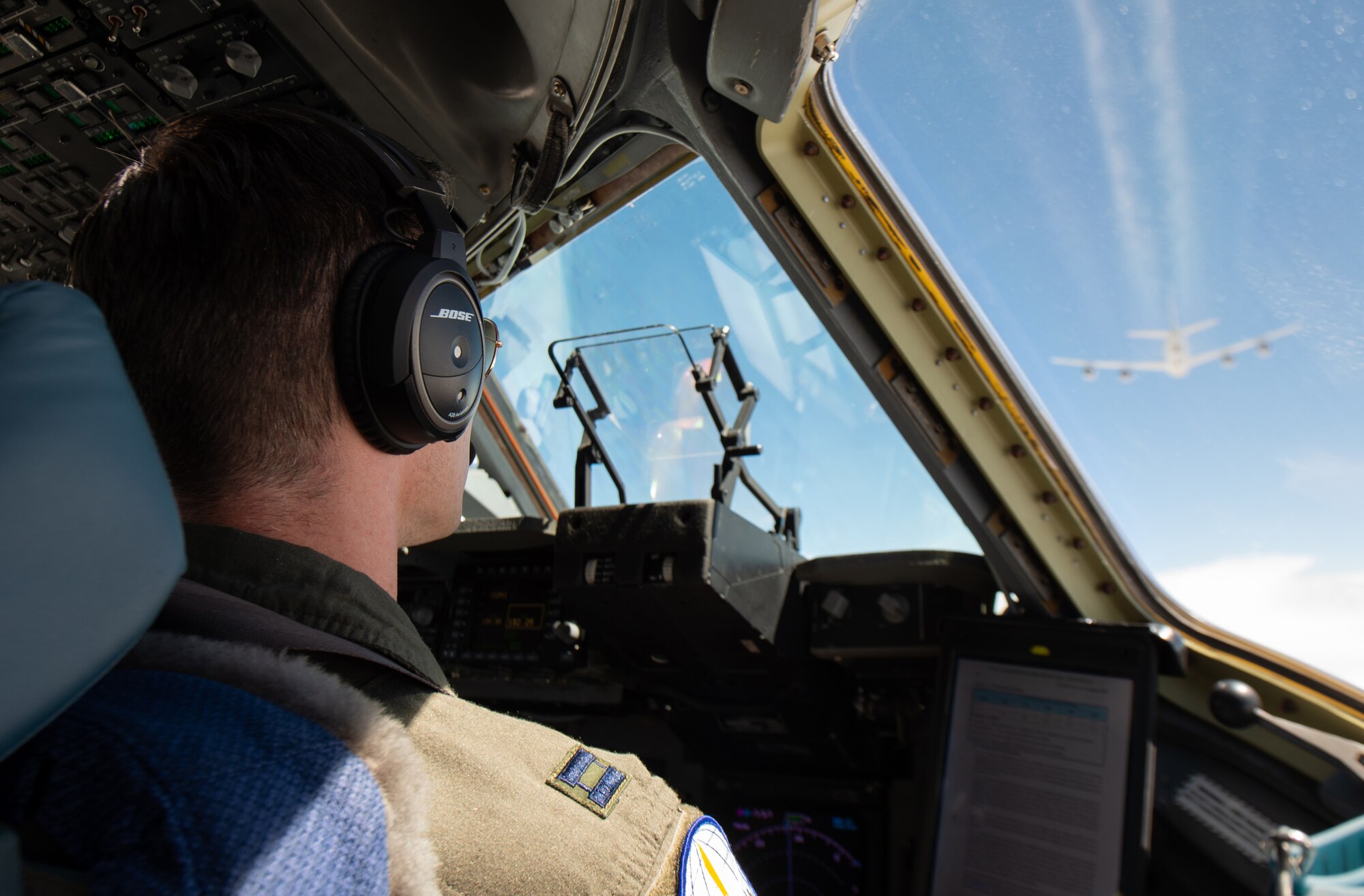 Capt. Shelby Foster, 7th Airlift Squadron (AS) pilot, flies a C-17 Globemaster III assigned to Joint Base Lewis-McChord, Wash., during an air refueling training sortie near Salt Lake City, Utah, July 27, 2020. The 7th AS is testing a new training program for aircrews that is designed to help protect training resources and more clearly correlate training with mission readiness. (U.S. Air Force photo by Senior Airman Tryphena Mayhugh)