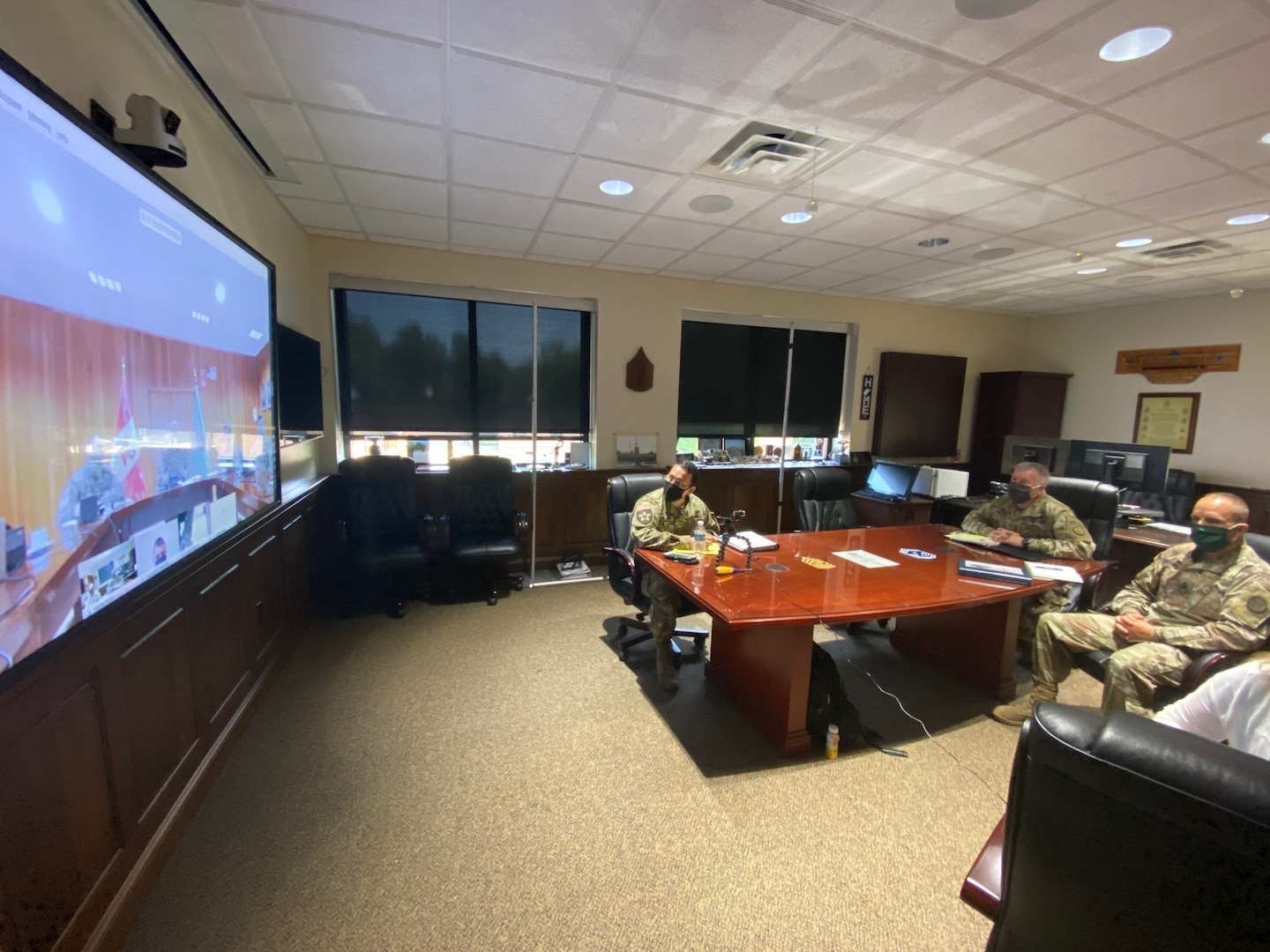 West Virginia National Guard Adjutant General, Maj. Gen. James Hoyer, alongside the Senior Enlisted Leader, Command Sgt. Maj. Phillip Cantrell participated in a video teleconference with the Peruvian Air Force's commanding general, Rodolfo Garcia and staff July 21, 2020, at the WVNG Joint Forces Headquarters in Charleston, West Virginia.