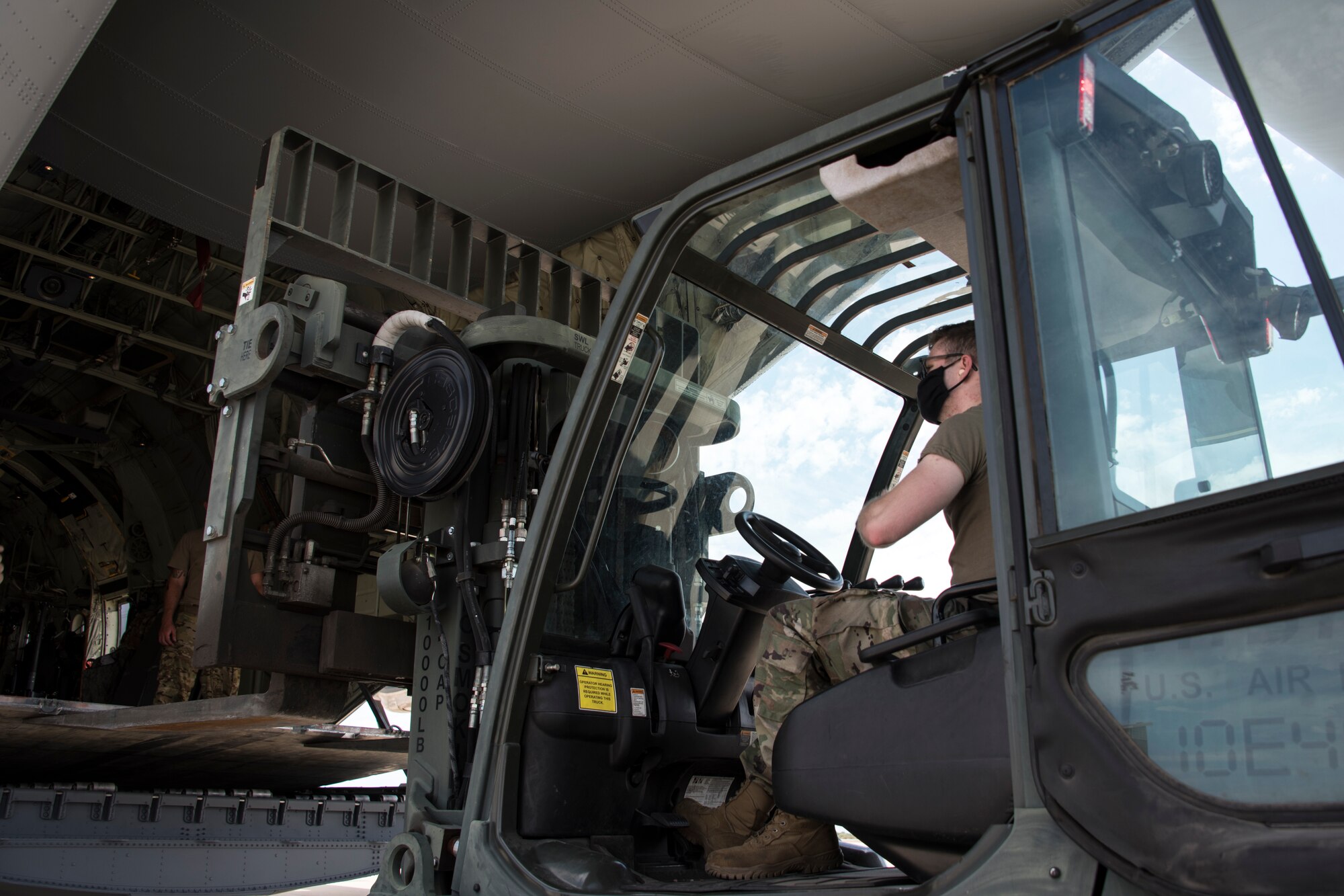 A photo of Airmen loading cargo during a training exercise