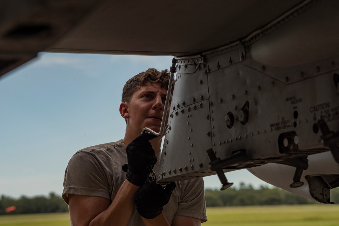 A photo of an Airman performing maintenance