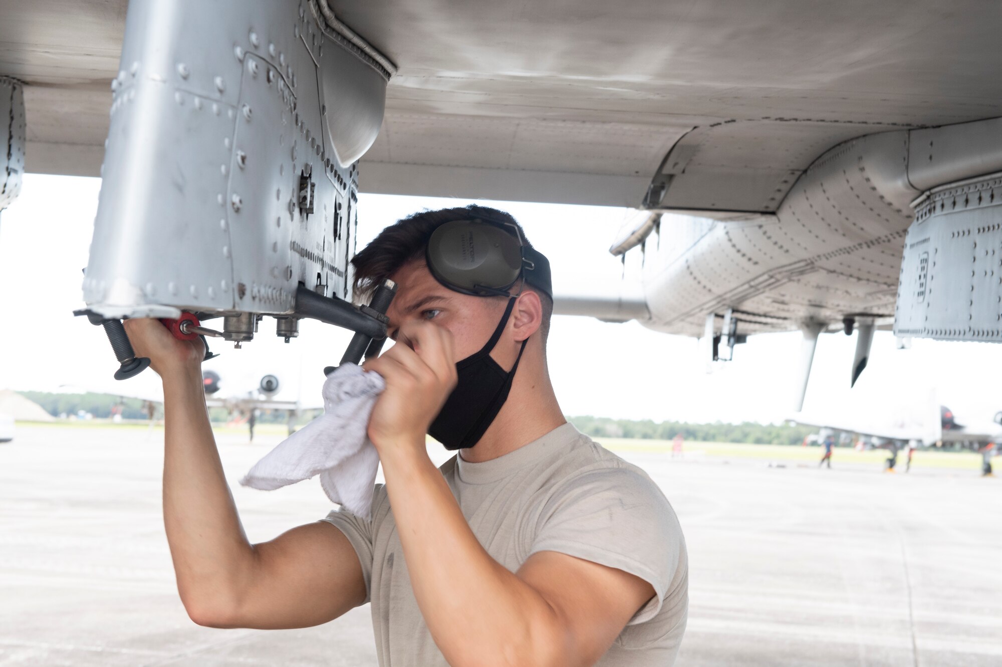 A photo of an Airman performing maintenance