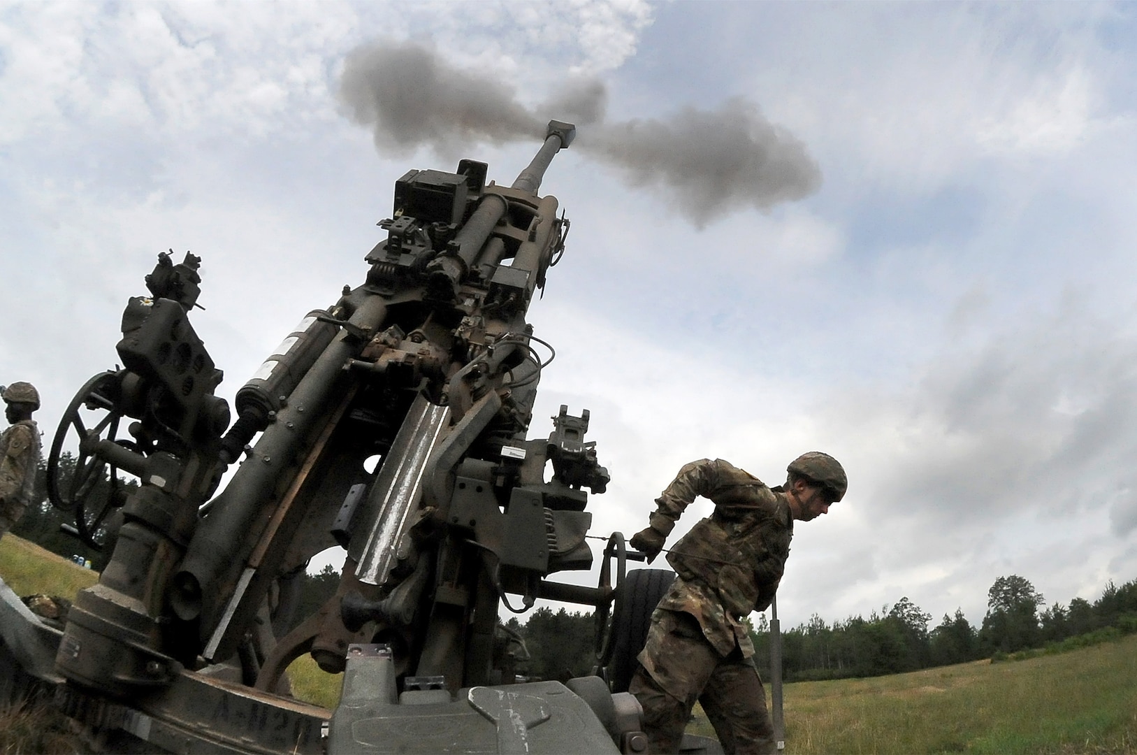 Soldiers with the Michigan Army National Guard's B Battery, 1st Battalion, 119th Field Artillery Regiment execute a direct fire mission during exercise Northern Strike at Camp Grayling, Michigan, July 26, 2020.