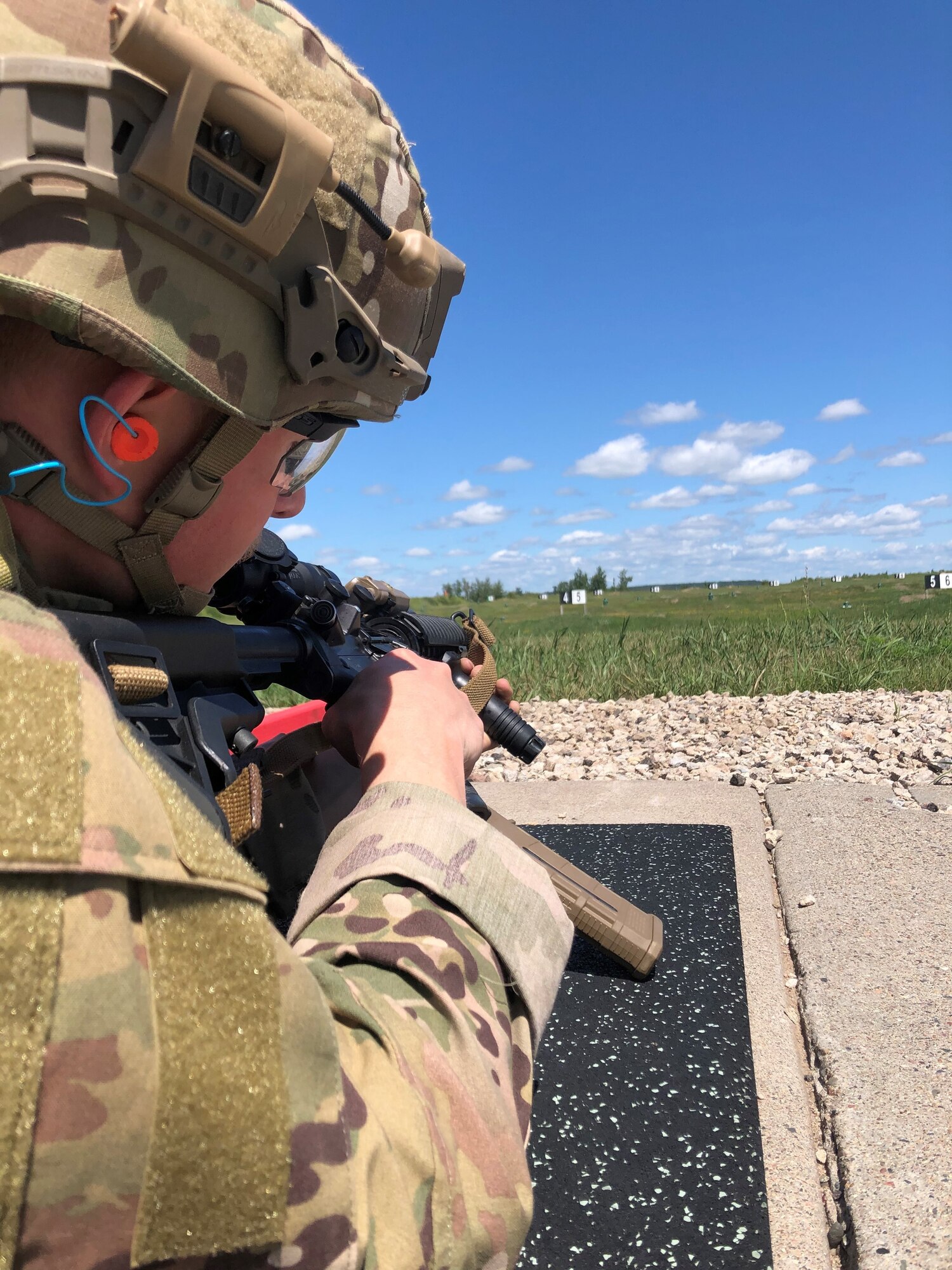 An Air National Guard Explosive Ordnance Disposal technician trains using advanced marksmanship techniques during a field training exercise at Camp Ripley Training Center, Minnesota, July 20-24, 2020.