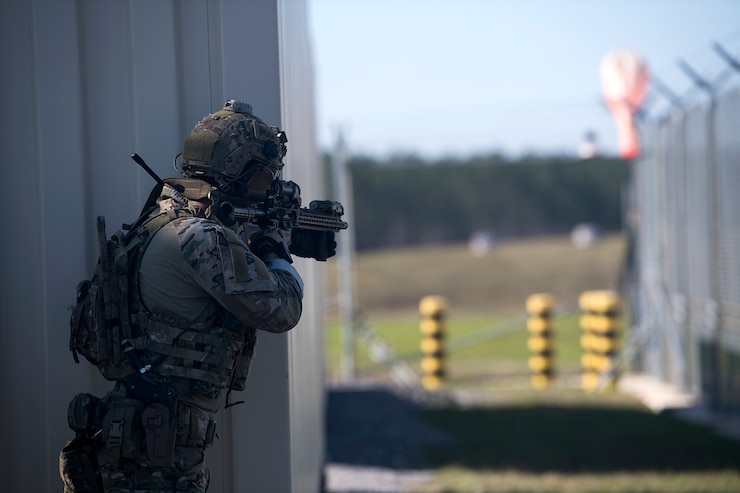 A U.S. Air Force Tactical Air Control Party Airman performs Close Quarters Battle during a Full Mission Profile with close air support from U.S. Navy MH-60S Nighthawks at Southern Strike 2020 near Camp Shelby Joint Forces Training Center, Miss., Feb. 7, 2020.