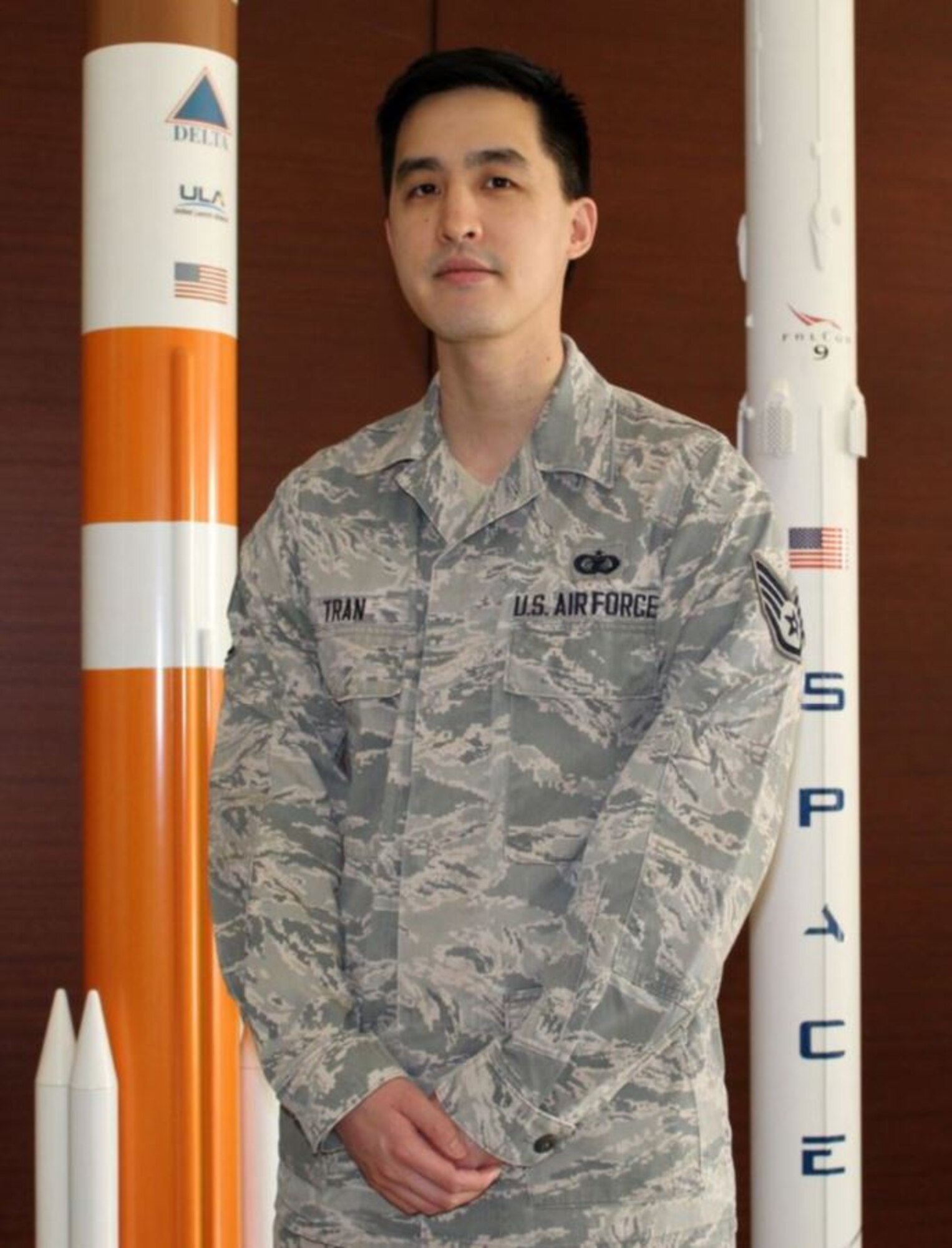 U.S. Air Force Staff Sgt. Vincent Tran, Space and Missile Systems Center Executive Support Services Administration Technician previously served as NCOIC of SMC Commanders Action Group as part of the Enlisted Developmental Duty Positions program at Los Angeles Air Force Base, Calif., July 15, 2020.  The EDDP program is a 61st Air Base Group initiative that grants the opportunity for enlisted Airmen to gain experience outside of their normal career field and duties, while supporting the overall Space and Missile Systems Center (SMC) mission. (U.S. Air Force photo by Staff Sgt. Randy Duffy)