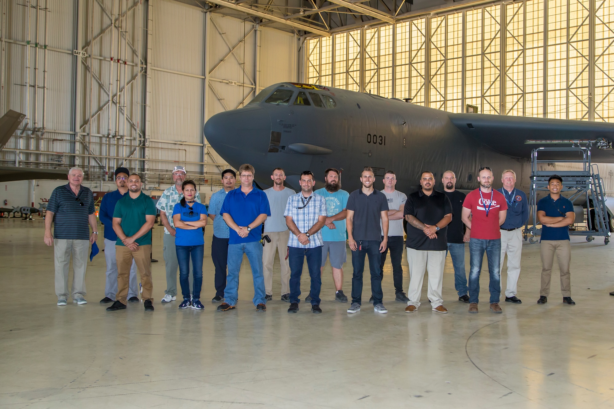 Members of the Bomber Instrumentation Team, 812th Aircraft Instrumentation Test Squadron, pose for a group photo in front of a B-52 Stratofortress at Edwards Air Force Base, California, Aug. 5, 2019. (Air Force photo by Ethan Wagner)