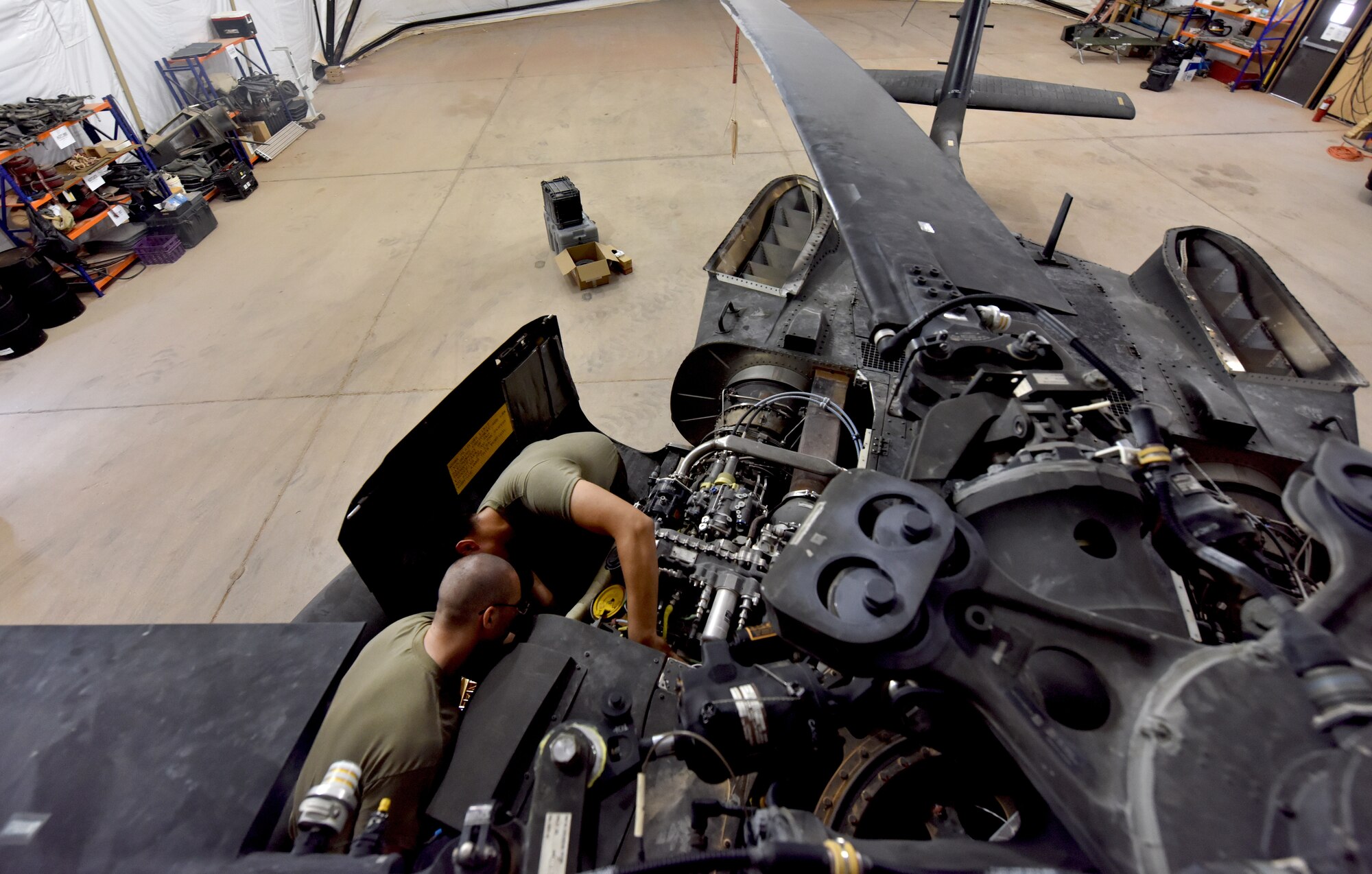 U.S. Army Soldiers from Task Force Javelin conduct maintenance on a UH-60 Blackhawk helicopter at Prince Sultan Air Base, Kingdom of Saudi Arabia