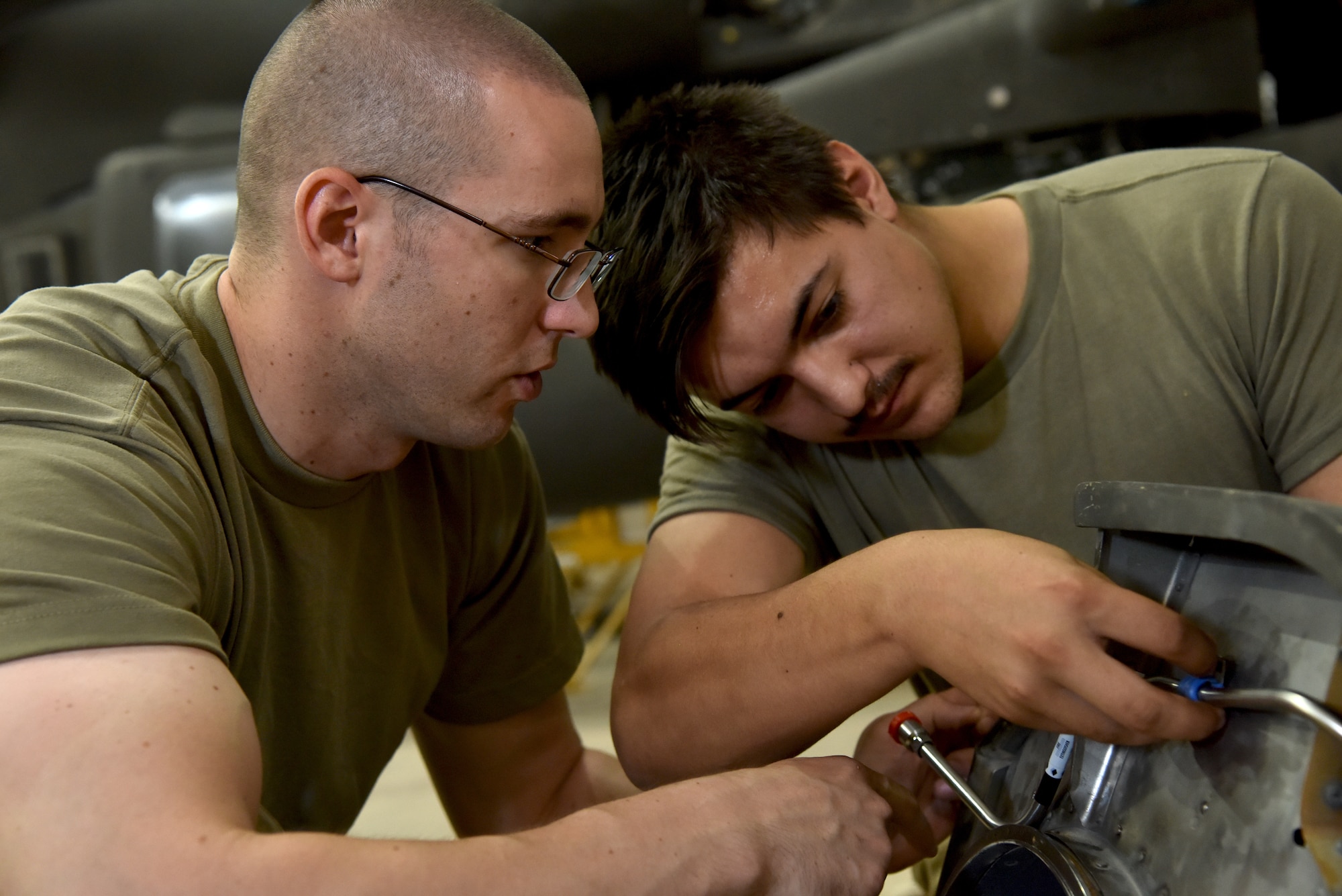 U.S. Army Soldiers from Task Force Javelin conduct maintenance on a UH-60 Blackhawk helicopter at Prince Sultan Air Base, Kingdom of Saudi Arabia