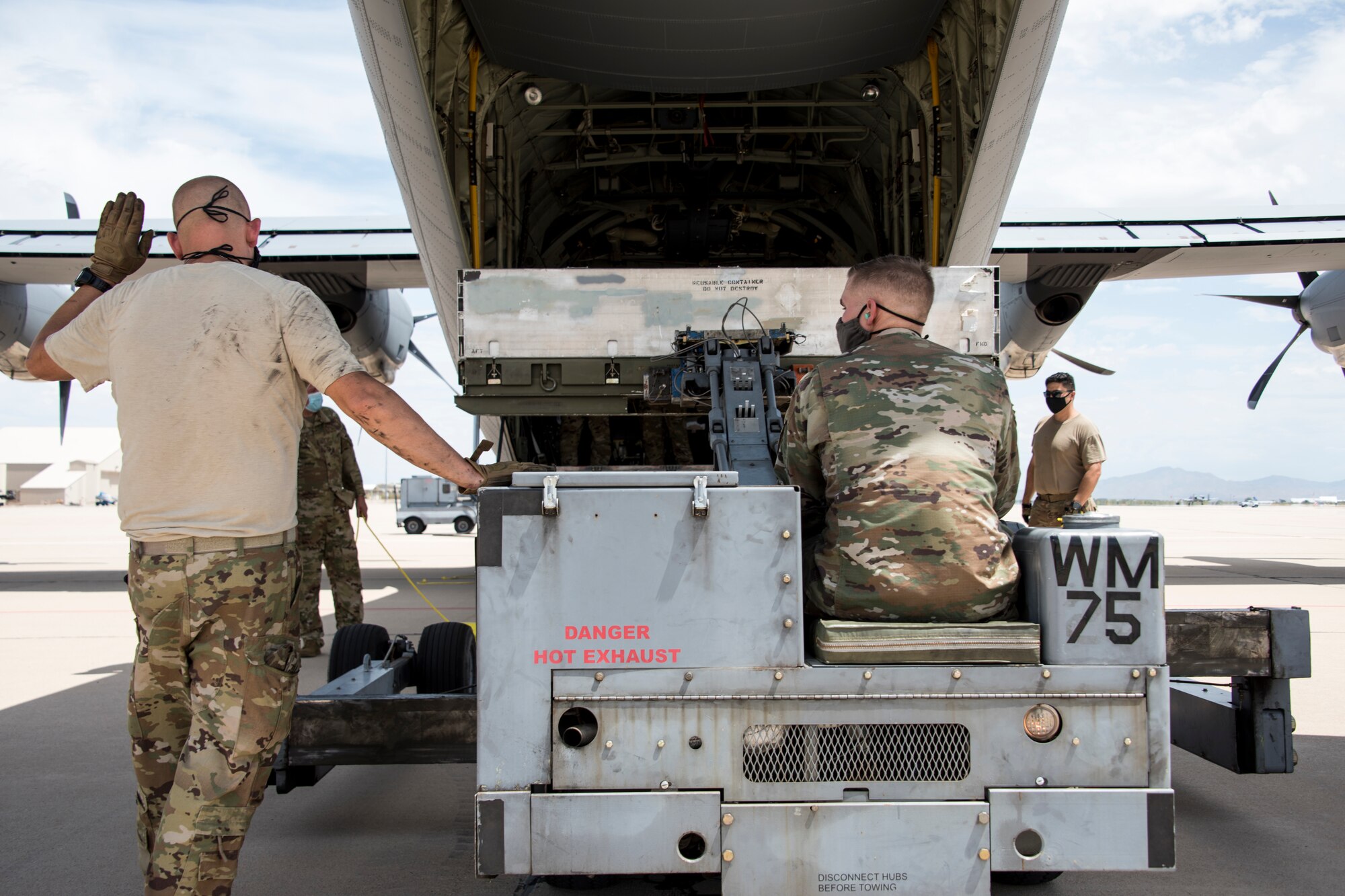 A photo of Airmen loading cargo during a training exercise