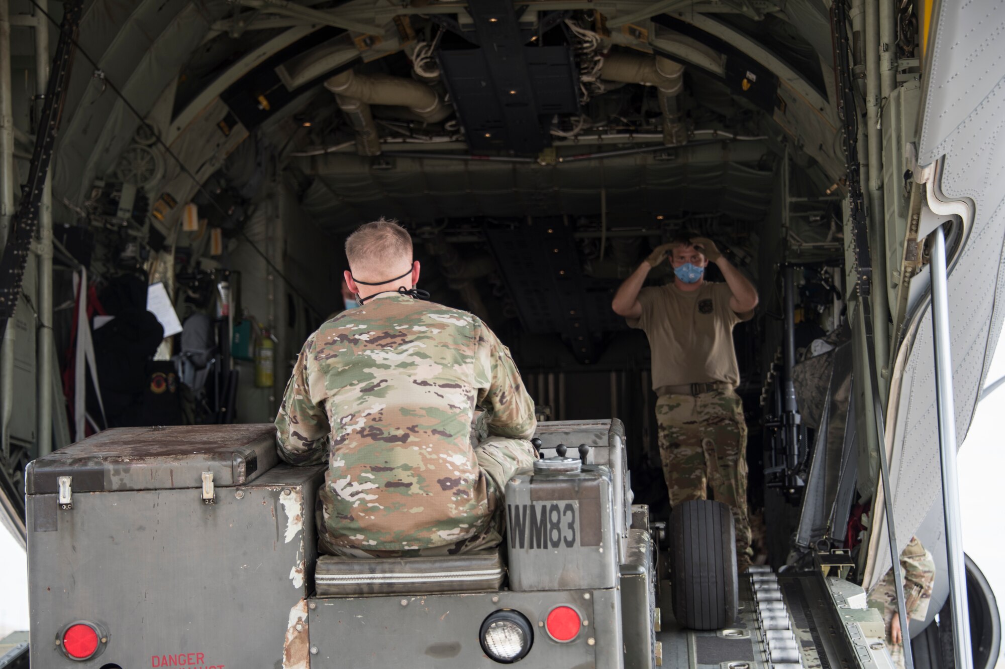 A photo of Airmen loading cargo during a training exercise