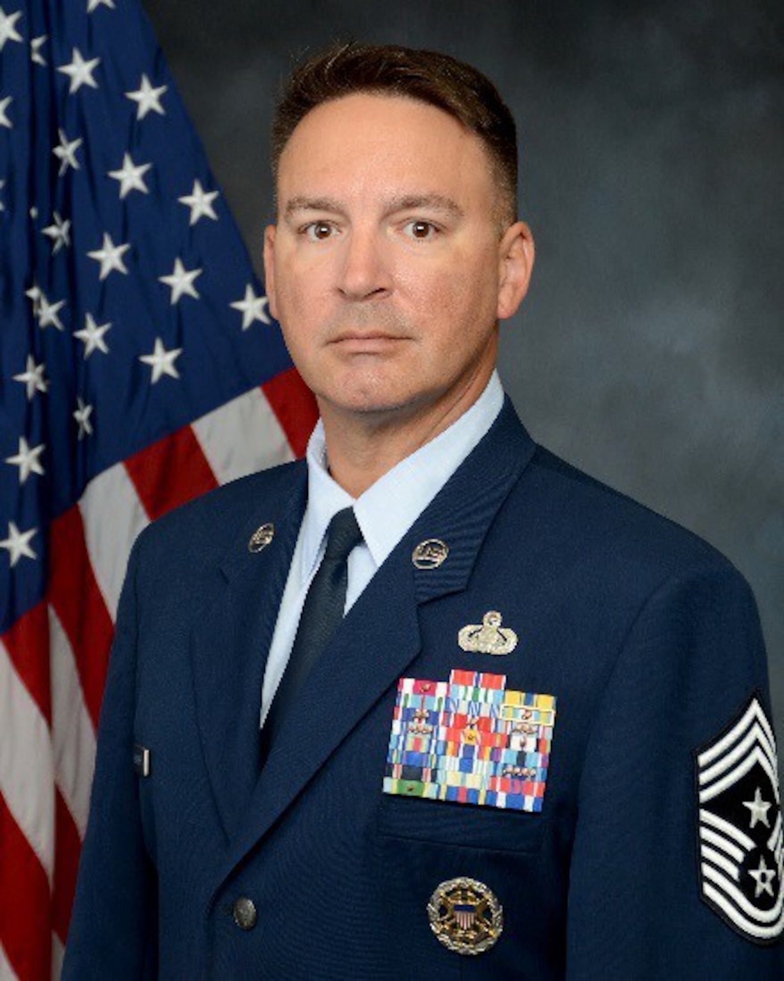 Chief Master Sgt. Brian Bischoff, 960th Cyberspace Wing command chief, stands for an official photo. (U.S. Air Force courtesy photo)