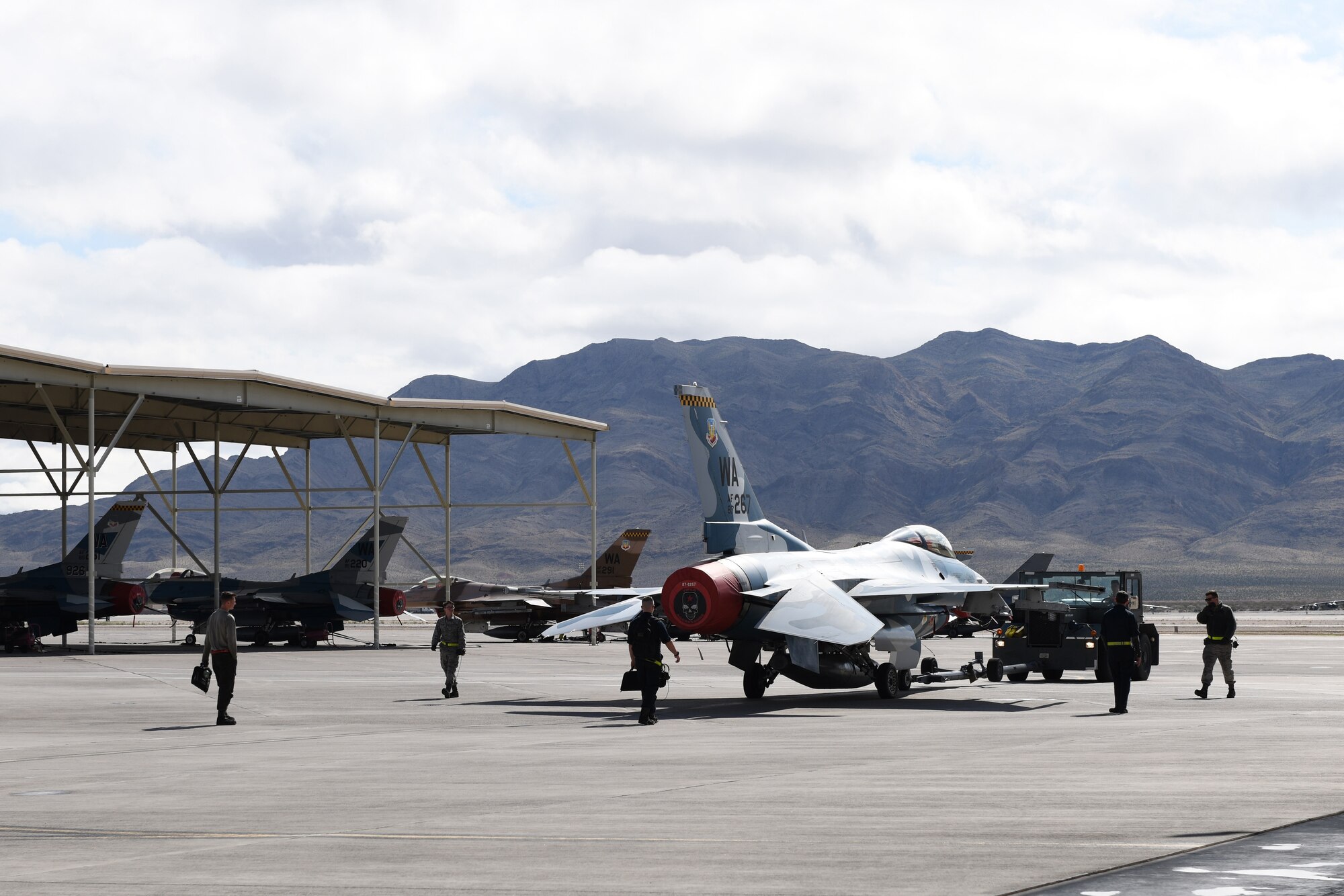 Maintenance Airmen working on the Nellis Air Force Base, Nevada, flight line.