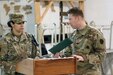 HARRISBURG – First Sgt. Valerie Jones (left), first sergeant of Alpha Company, Headquarters and Headquarters Battalion, 28th Infantry Division, confers with the company’s readiness NCO, Sgt. 1st Class Sean Cleary, prior to a ceremony at Harrisburg Military Post Jan. 11, 2020. Jones is the first female first sergeant of one of the four companies that comprise the division headquarters battalion. U.S. Army photo by Sgt. 1st Class Doug Roles