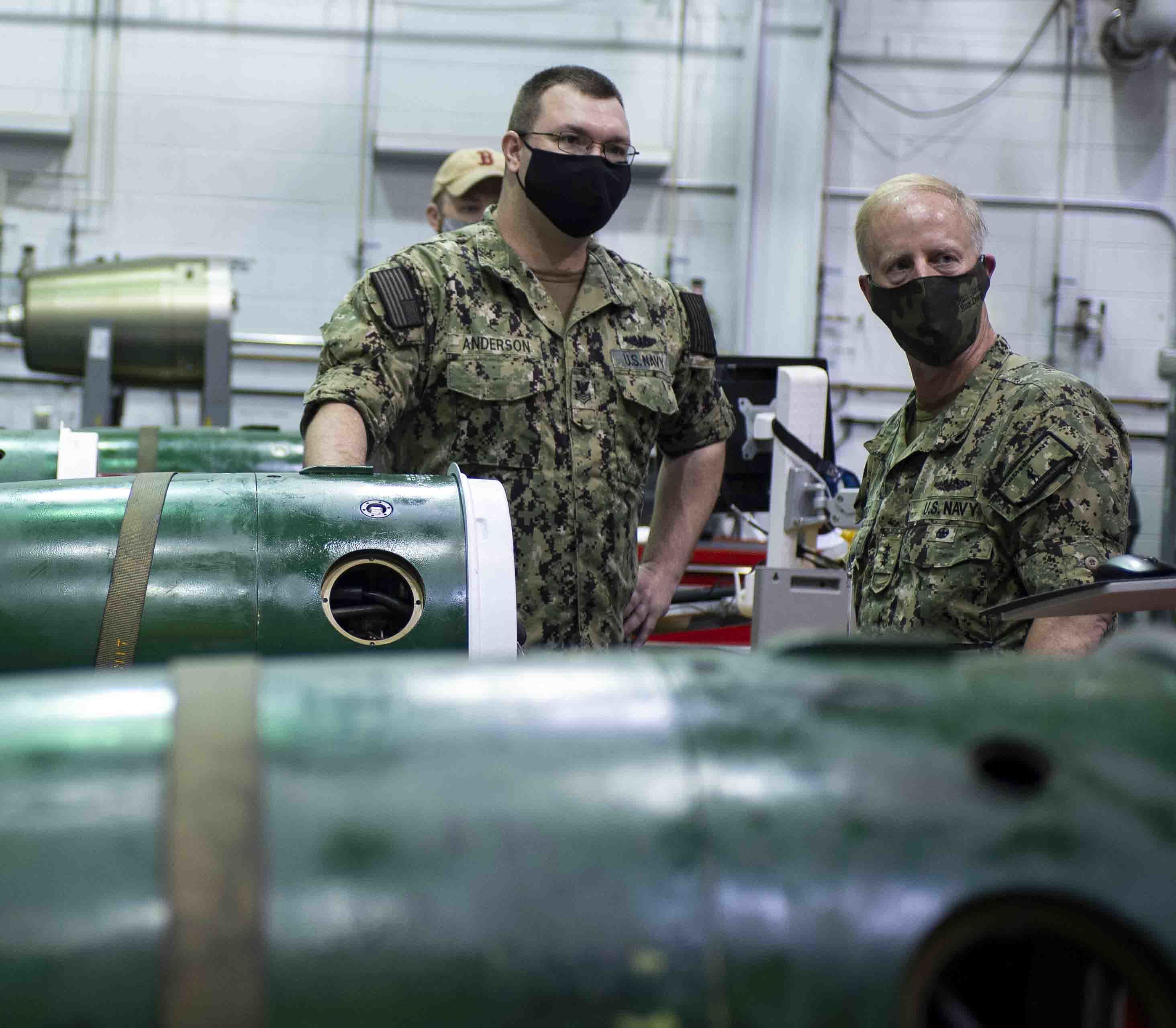 Torpedoman 1st Class Gary Anderson explains the components of a Mark 48 torpedo.