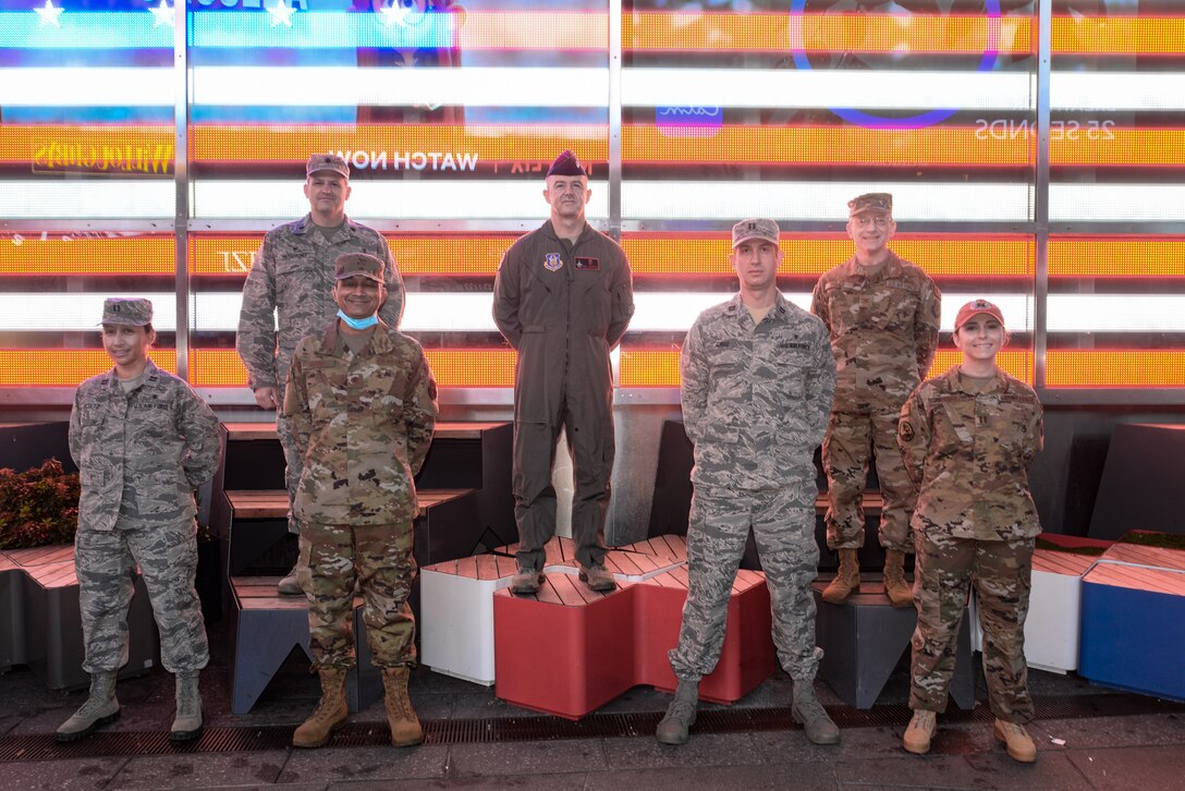 Air Force Reserve physician assistants who deployed to New York City to serve on the front lines of America's battle against COVID-19 pose for a photo. Left to right are Capt Kamille Resetz, Lt. Col. Matt Bershinsky, Maj. William Steele, Lt. Col. Troy Houston, Capt. Andrew Cruz, Col. Ari Fisher and Capt. Heather Duggan. (Army Sgt 1st Class Greg Sanders, 22nd Mobile Public Affairs Detachment)