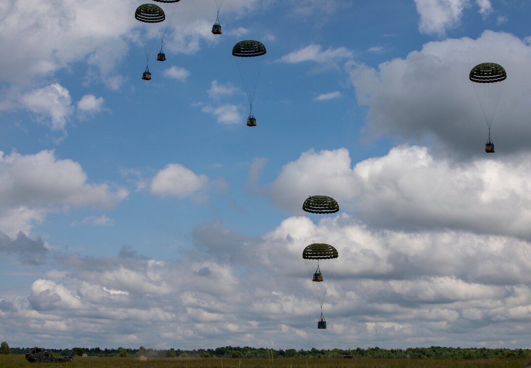 Airmen from the New York Air National Guard's 109th Airlift Wing piloted a C-130J Hercules, airdrops pallets of supplies during a container delivery system training exercise, July 23, 2020.