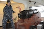 Joshua Hammond fires a ceremonial round from USS Constitution's saluting battery