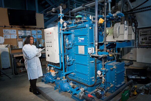 Sheila Riggs analyzes data from the Membrane Bio Reactor at Naval Surface Warfare Center, Carderock Division in West Bethesda, Md.