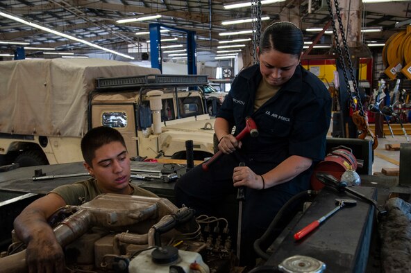 U.S. Air Force Airman 1st Class Sebastian Nucatola, a 6th Logistics Readiness Squadron vehicle mechanic, loosens a bolt on an MB-2 aircraft tow tractor, July 15, 2020, at MacDill Air Force Base, Fla.