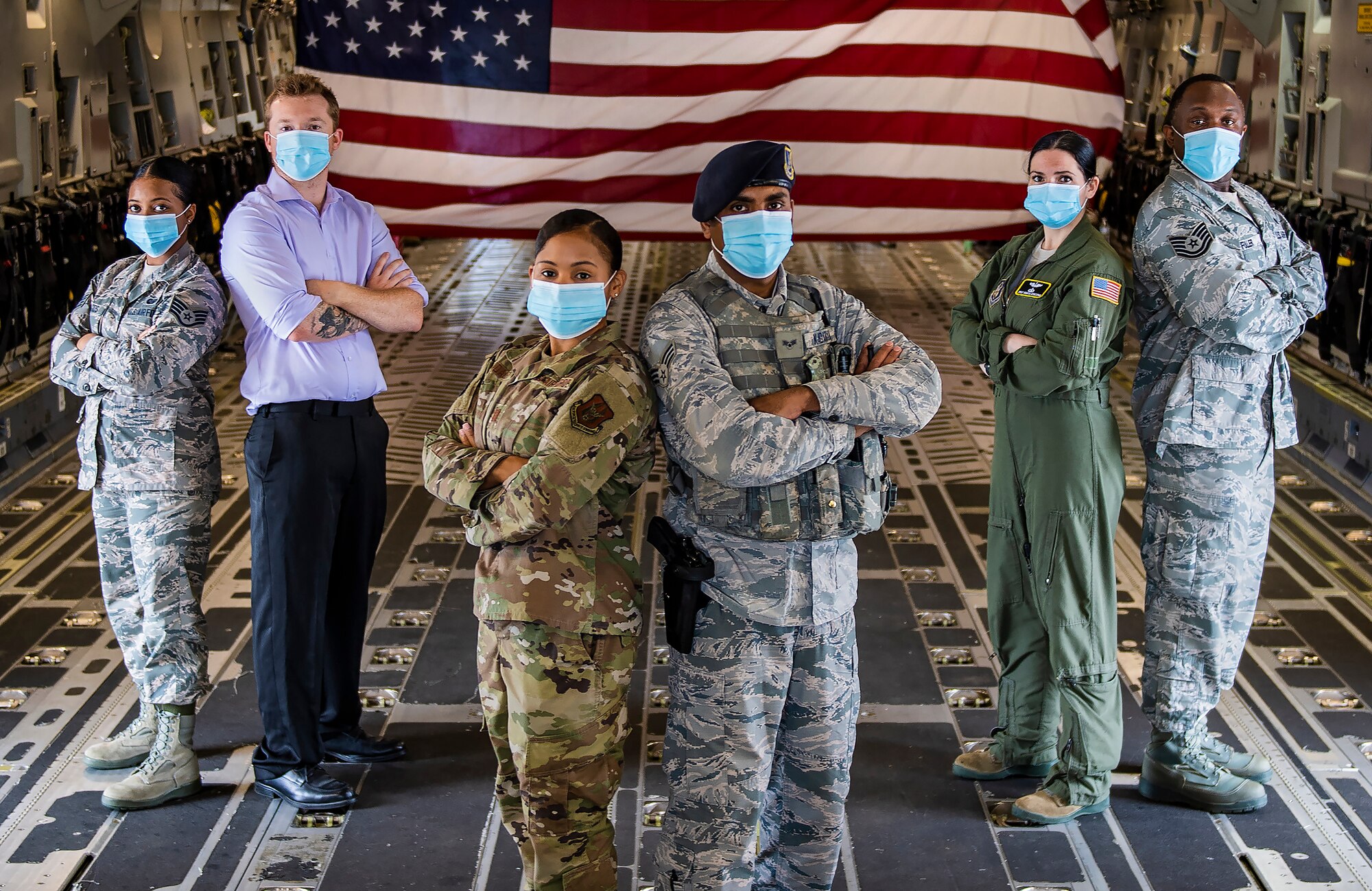 Airmen assigned to the 911th Airlift Wing pose for a portrait photo at the Pittsburgh International Airport Air Reserve Station, Pennsylvania, June 23, 2020. The 911th AW, like every organization within U.S. Air Force Reserve Command, is made up of many individuals with diverse backgrounds. (Joshua J. Seybert)