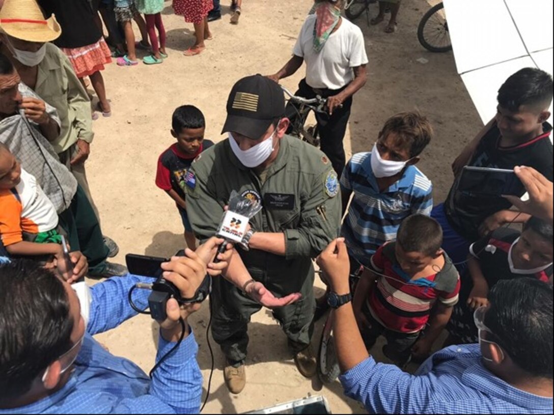 U.S. Defense Attache Service member Maj. Steve Souza speaks with local Honduran media during a visit to San Lorenzo, June 25. (Photo courtesy of U.S. Defense Attache Office)
