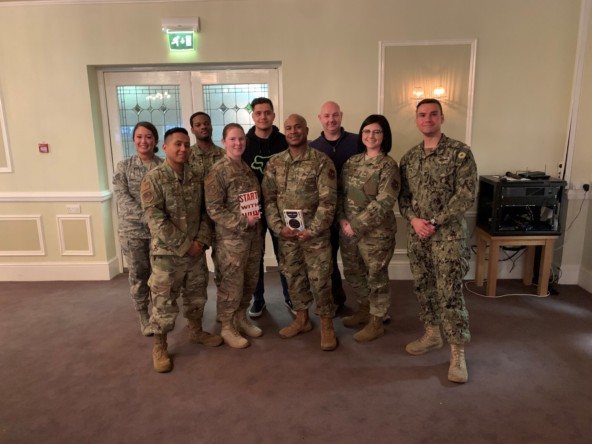 U.S. Air Force Staff Sgt Kaylee Champion, second from far right, 501st Combat Support Wing logistics planner, poses for a group photo with the 423rd Air Base Group Joint Service 5/6 Council at the NCO Social at RAF Alconbury, England, March 2020. The council learned professional development skills and furthered their NCO leadership skills. (Courtesy photo).