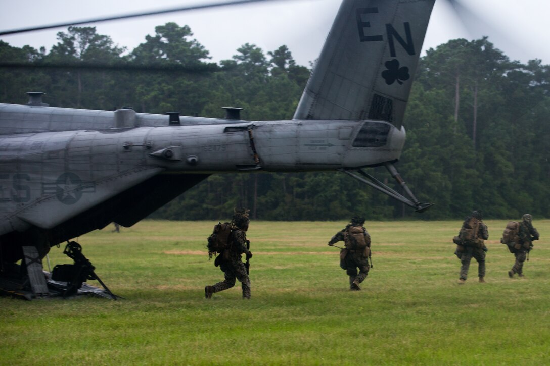 U.S. Marines with 2d Battalion, 2d Marine Regiment, 2d Marine Division execute an aerial infiltration as part of Exercise Deep Water on Camp Lejeune, North Carolina, July 29, 2020. Deep Water is a 2d Marine regiment-led exercise designed to provide Marine Air-Ground Task Force capabilities, which increases lethality and combat effectiveness for future combat operations. The exercise included the largest air-assault conducted in decades.