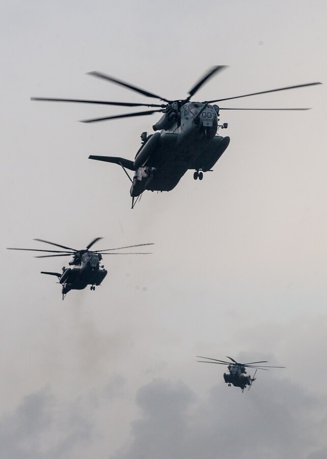 U.S. Marines with 2d Marine Air Wing prepare to drop Marines with 2d Battalion, 2d Marine Regiment, 2d Marine Division as part of Exercise Deep Water at Camp Lejeune, North Carolina, July 29, 2020. Deep Water is a 2d Marine regiment-led exercise designed to provide Marine Air-Ground Task Force capabilities, which increases lethality and combat effectiveness for future combat operations. The exercise included the largest air-assault conducted in decades.