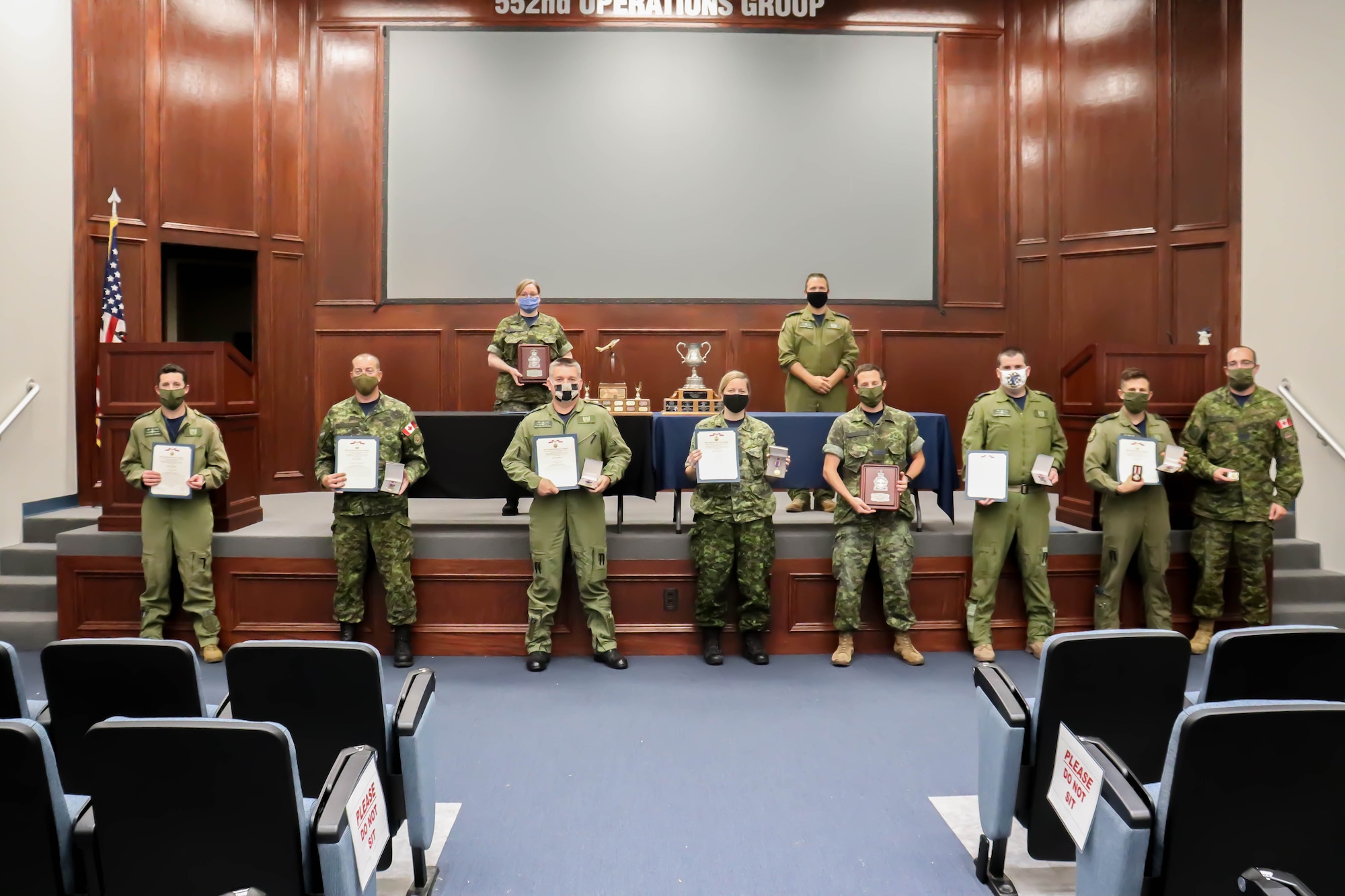 Members of the Canadian Detachment with the 552nd Air Control Wing at Tinker Air Force Base, Oklahoma, are recognized with Air Medals and Oak Leaf Clusters. The individuals distinguished themselves by providing critical command, control and communications support during 20 or more missions in Operation Enduring Freedom, Operation INHERENT RESOLVE and Operation FREEDOM SENTINEL (U.S. Air Force photo by 1st Lt. Ashlyn K. Paulson).