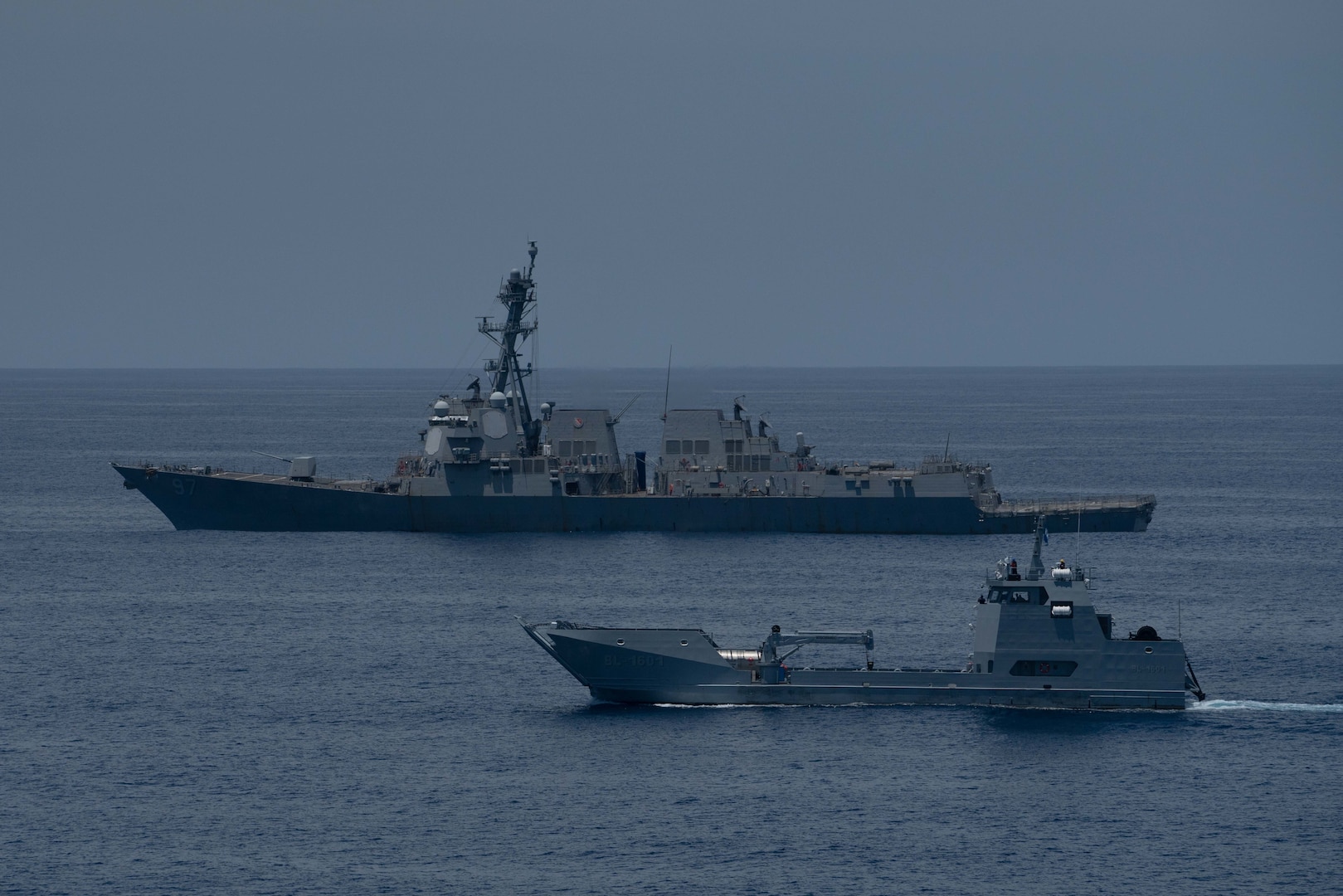 USS Halsey (DDG 97) participates in a passing exercise (PASSEX) with Guatemalan navy Quetzal Landing Craft, Utility (LCU) BL-1601.