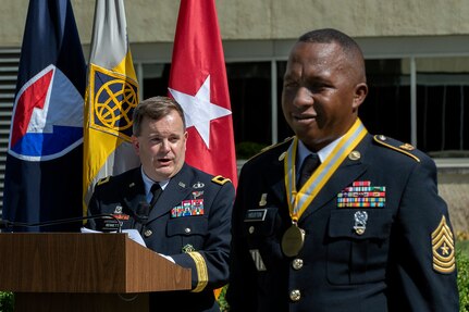 Brig. Gen. Mark S. Bennett, U.S. Army Financial Management Command commanding general, delivers remarks praising recently retired Sgt. Maj. Ronald Houston, U.S. Army Financial Management Command Operations senior enlisted advisor, during Houston’s retirement ceremony at the Maj. Gen. Emmett J. Bean Federal Center in Indianapolis July 17, 2020. During his time at USAFMCOM, Houston oversaw all operational taskings, day-to-day functions and training of the command. (U.S. Army photo by Mark R. W. Orders-Woempner)
