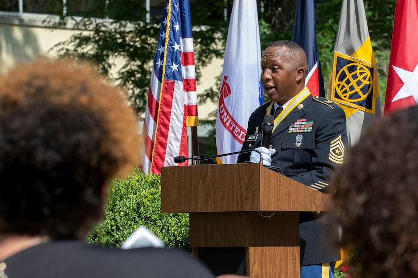 Recently retired Sgt. Maj. Ronald Houston, U.S. Army Financial Management Command Operations senior enlisted advisor, addresses family and friends during his retirement ceremony at the Maj. Gen. Emmett J. Bean Federal Center in Indianapolis July 17, 2020. Houston ended his remarks by dropping the microphone while stating, “Service to Soldiers, Sergeant Major Houston out!” (U.S. Army photo by Mark R. W. Orders-Woempner)