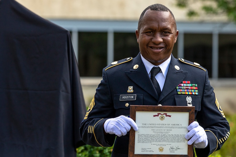 Sgt. Maj. Ronald Houston, U.S. Army Financial Management Command Operations senior enlisted advisor, poses for a photo after being awarded a Legion of Merit medal during his retirement ceremony at the Maj. Gen. Emmett J. Bean Federal Center in Indianapolis July 17, 2020. Houston’s awards and decorations include a Bronze Star Medal, five Meritorious Service Medals, a Joint Service Commendation Medal, five Army Commendation Medals, four Army Achievement Medals, nine Good Conduct Medals, and he is the 358th recipient of the Major General Nathan Townsend Medallion. (U.S. Army photo by Mark R. W. Orders-Woempner)