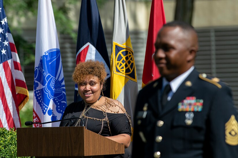 Shani Adams-Houston looks at her husband, Sgt. Maj. Ronald Houston, U.S. Army Financial Management Command Operations senior enlisted advisor, as she delivers special remarks congratulating him during his retirement ceremony at the Maj. Gen. Emmett J. Bean Federal Center in Indianapolis July 17, 2020. Sergeant Major Houston retired from the Army after more than 28 years of military service. (U.S. Army photo by Mark R. W. Orders-Woempner)