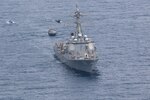 The U.S. Navy Arleigh Burke-class guided-missile destroyer USS Kidd (DDG 100) participates in a passing exercise (PASSEX) with El Salvadoran Navy Maritime Patrol Vessel 13 (PM-13) , July 29, 2020.